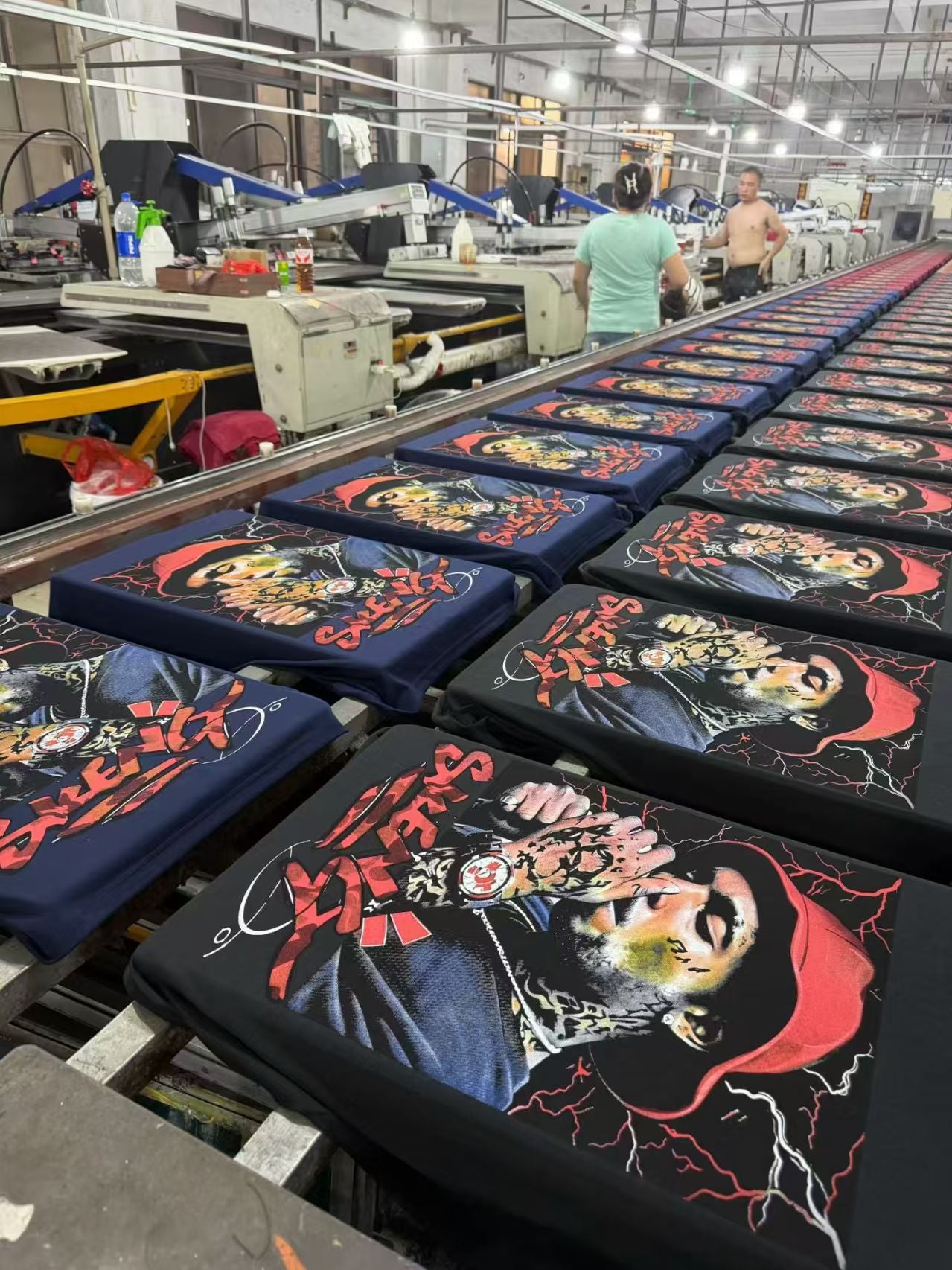 Printed T-shirts on the production line in our China factory